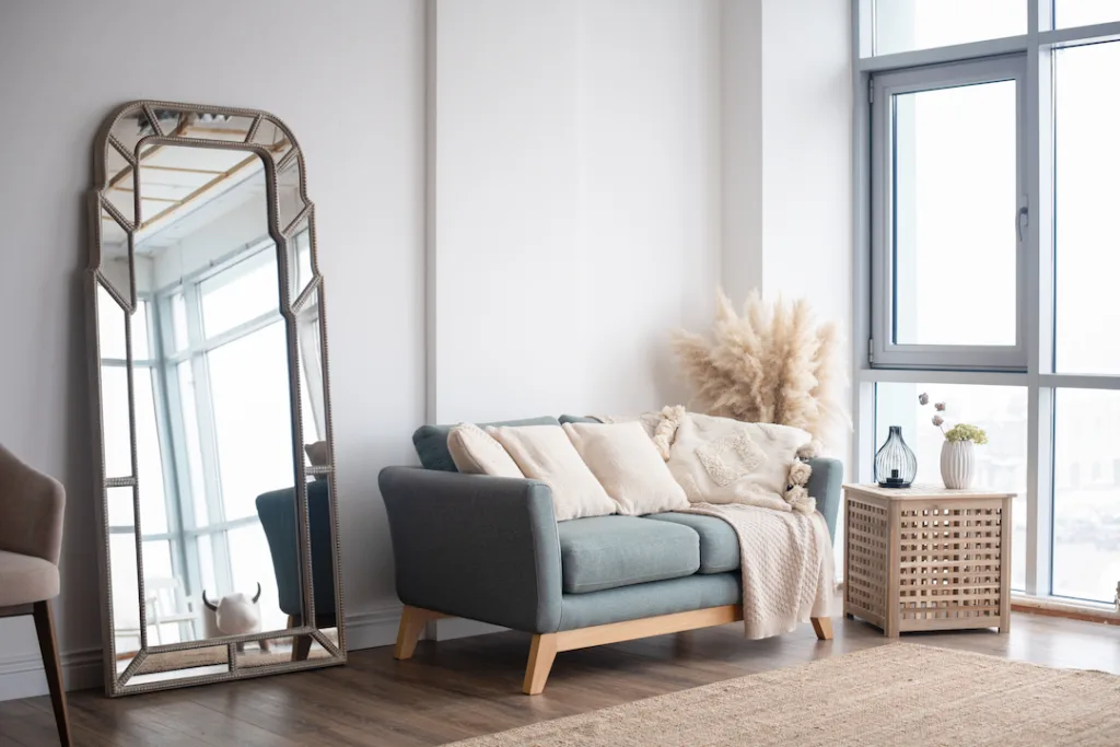 Stylish Scandinavian modern white cozy eco interior in minimalist style.Modern home decor. Open space.