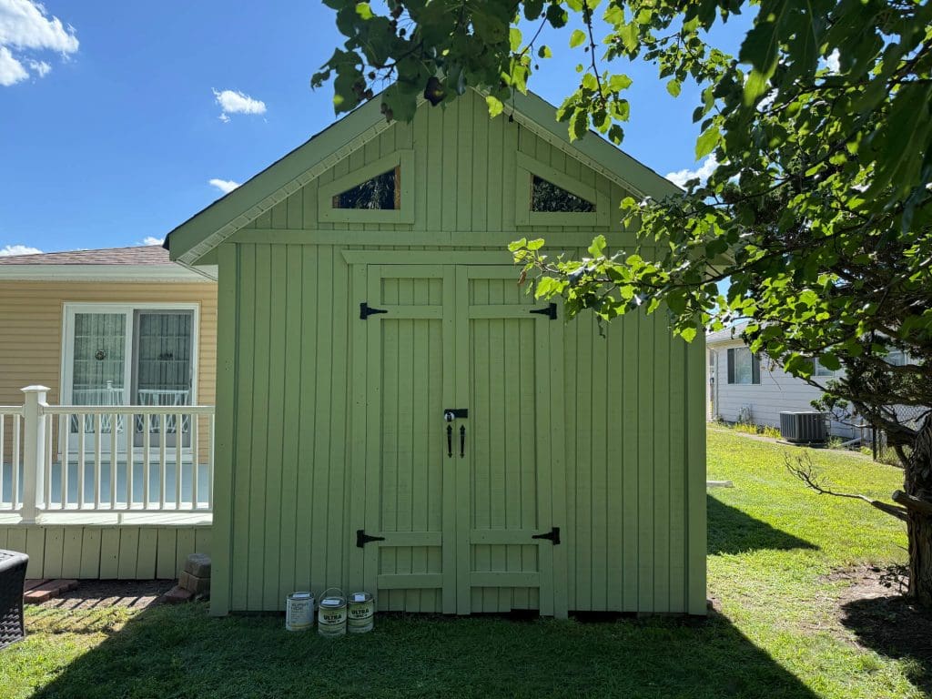before of a newly painted green barn in ocean county, nj
